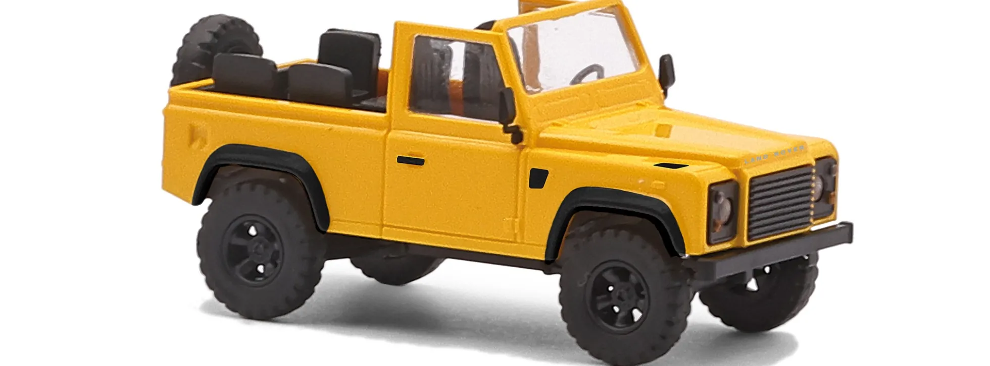 BUSCH 54392 Land Rover Defender 90 offen - gelb | Modellbauto 1:87