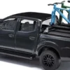 BUSCH 53724 Nissan Navara mit zwei Bikes | Modellauto 1:87