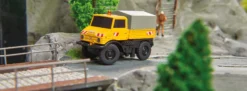 CARSON 500504146 MB Unimog U406 Zweiwegefahrzeug | 2.4GHz | RC Auto 1:87 Spur H0